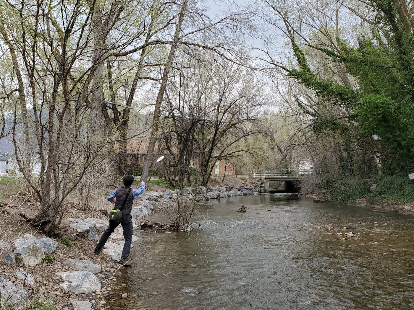 Throwing across a creek from the rocks, bag on